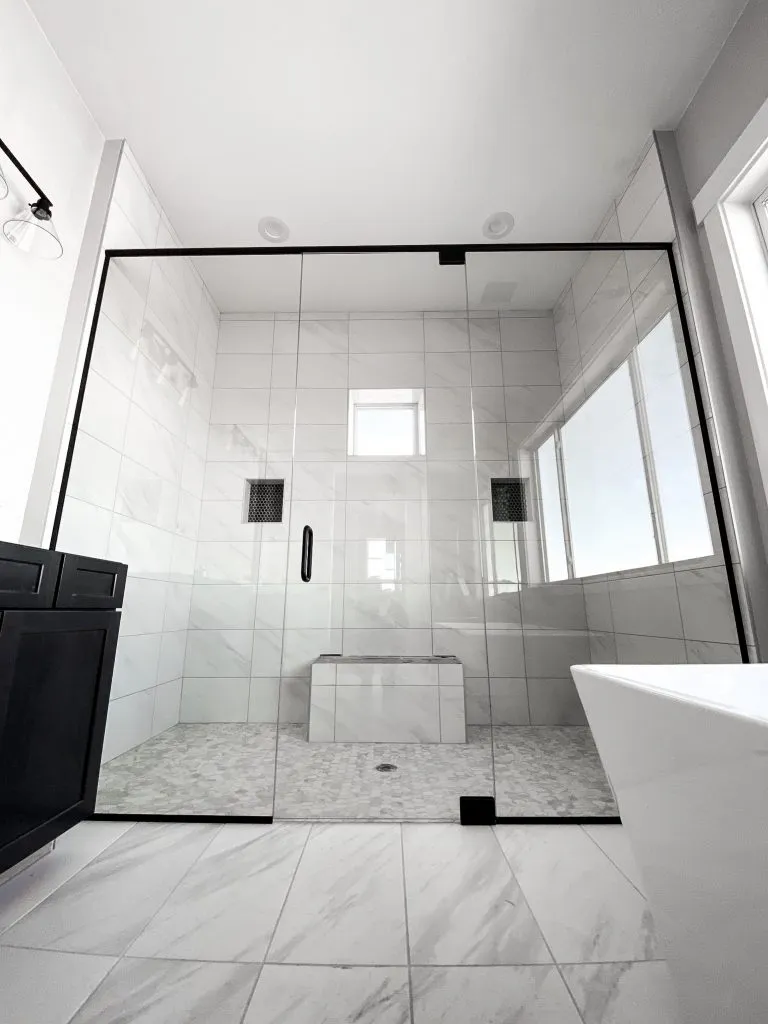 Pivot Door frameless shower glass layout in a bathroom