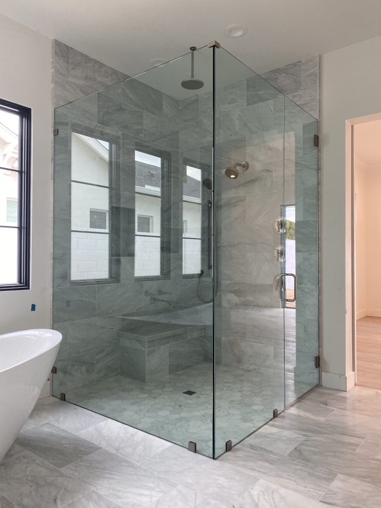 Flat 90 Degree frameless shower layout in a bathroom
