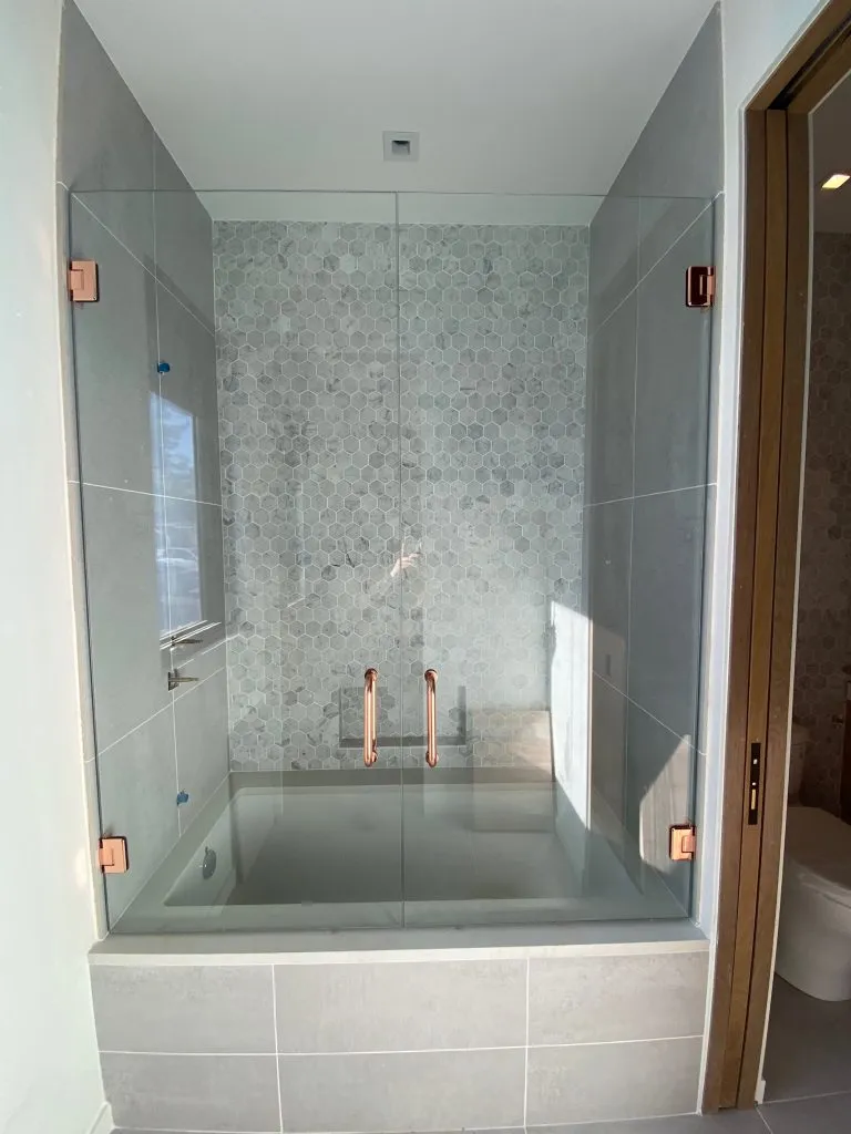 Frameless-Shower-Doors-on-tub