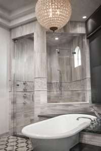 Bathroom with frameless steam shower glass