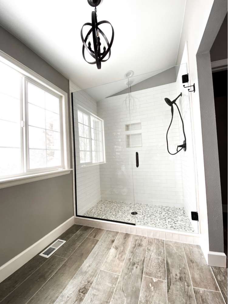 Shower in a bathroom with frameless glass