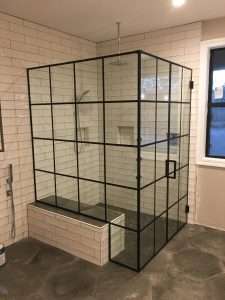 grid showers brown tile matte black gray glass