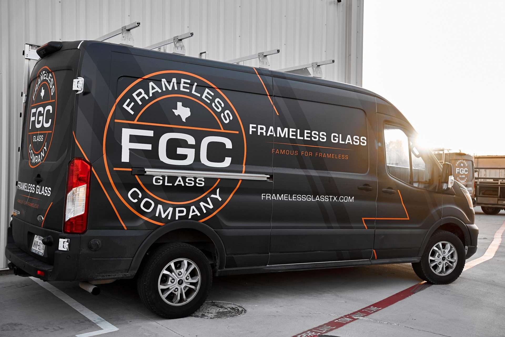 frameless glass company van